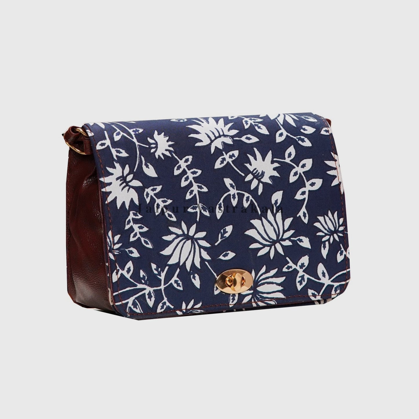 Indigo Lotus Lock Sling Bag