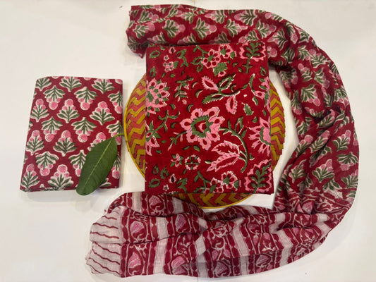 Set of red floral-patterned fabric items