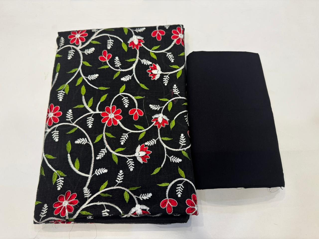 Black Whispers Embroidery Kota Doriya Suit